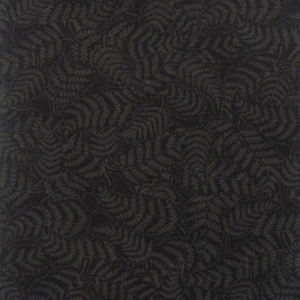 A quilting fabric featuring a charcoal fern print on a black background.