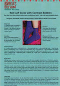 A knitting pattern leaflet for Annabelle's Collections, showing the back view of roll cuff socks with contrast bobbles.