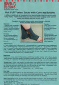 A leaflet for a knitting pattern titled 'Roll Cuff Toeless Socks with Contrast Bobbles' by Annabelle's Collections, detailing the sock design and materials required.