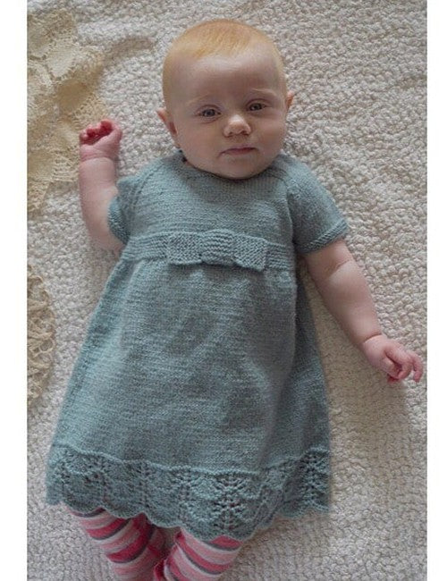 Baby Cakes Knitting Pattern 65 - Eleanor Lace Edge Dress with Knitted Bow in 8-ply / DK