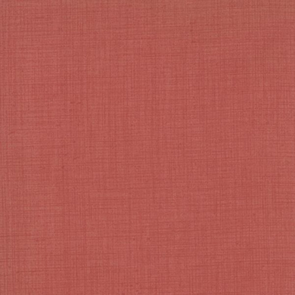 A solid red colored fabric from the French General Blender collection.