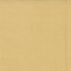 A beige-yellow piece of fabric, for use as a blender for quilting, made of cotton material.